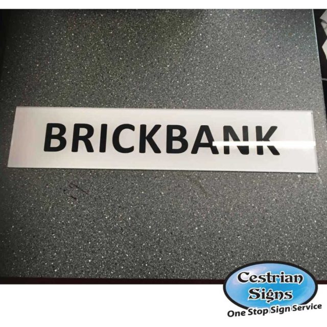 Perspex office sign with black lettering