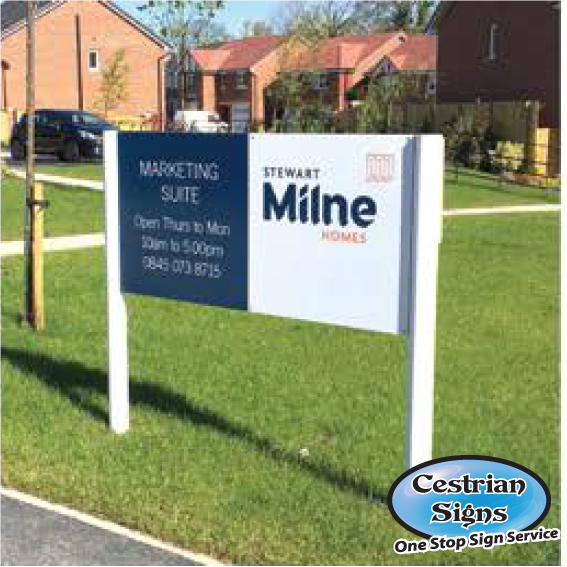 new housing sign on white posts